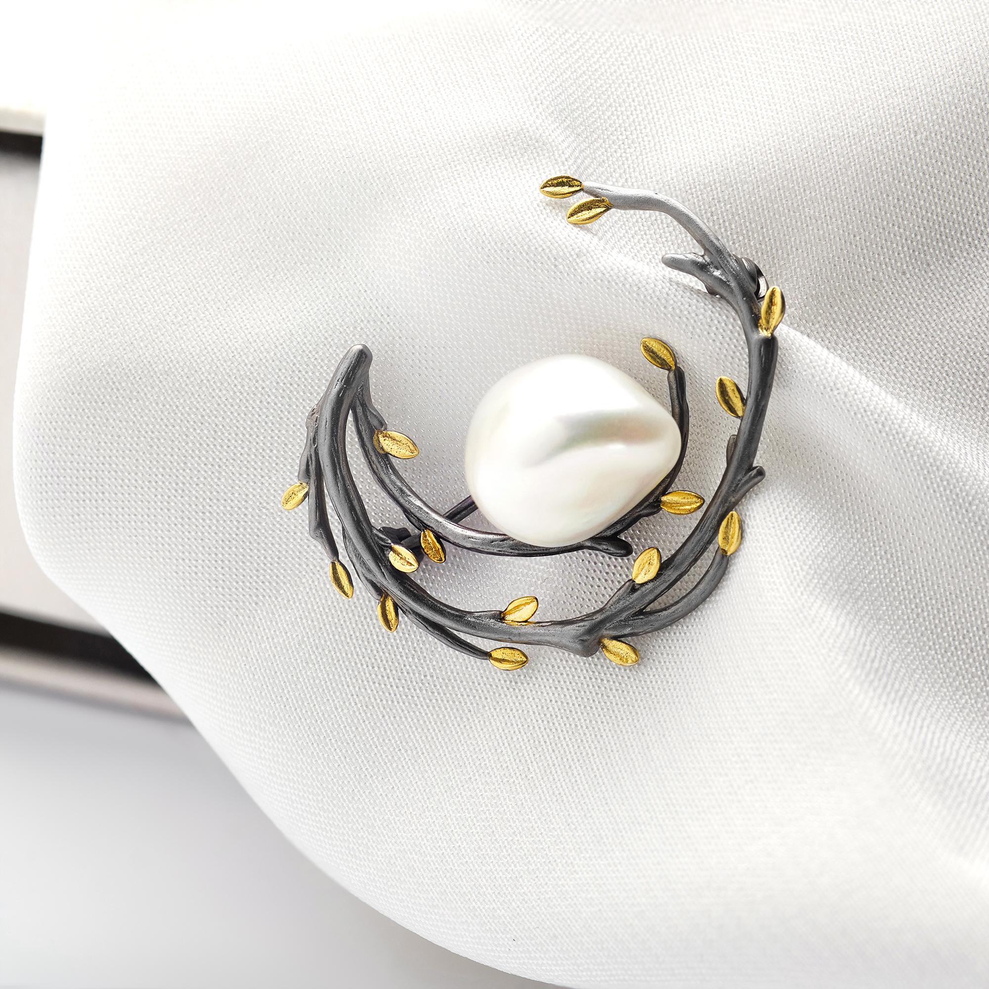 Close detail of gold thread monogram